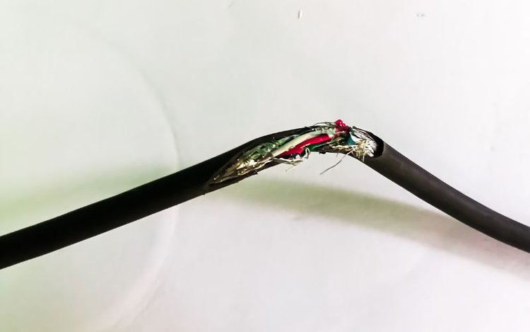 a damaged black cable