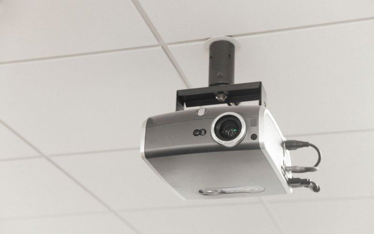 a projector mounted on the ceiling