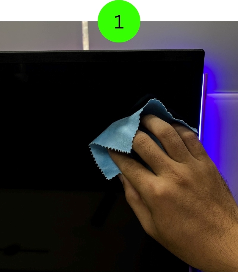 clean a TV screen with a dry microfiber cloth