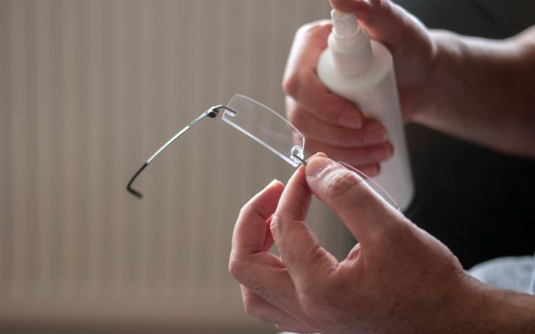 cleaning eyeglasses using an eyeglass cleaner