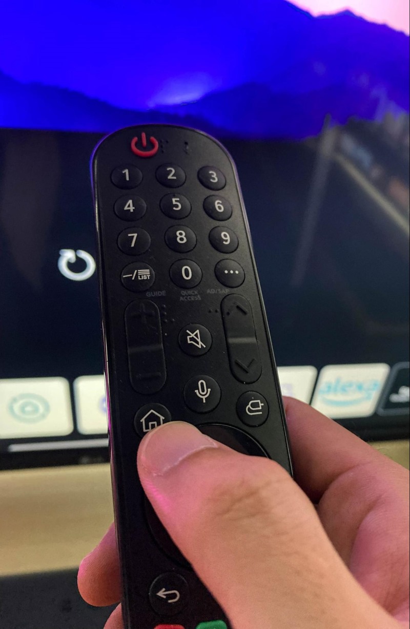 press the Home button on the LG TV remote