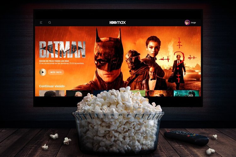 HBO Max Batman on TV screen behind a bowl of popcorn