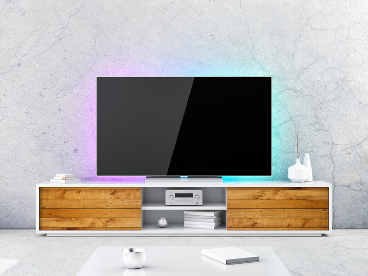 TV with LED lights behind in a room