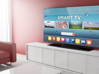 a smart TV on stand in a living room