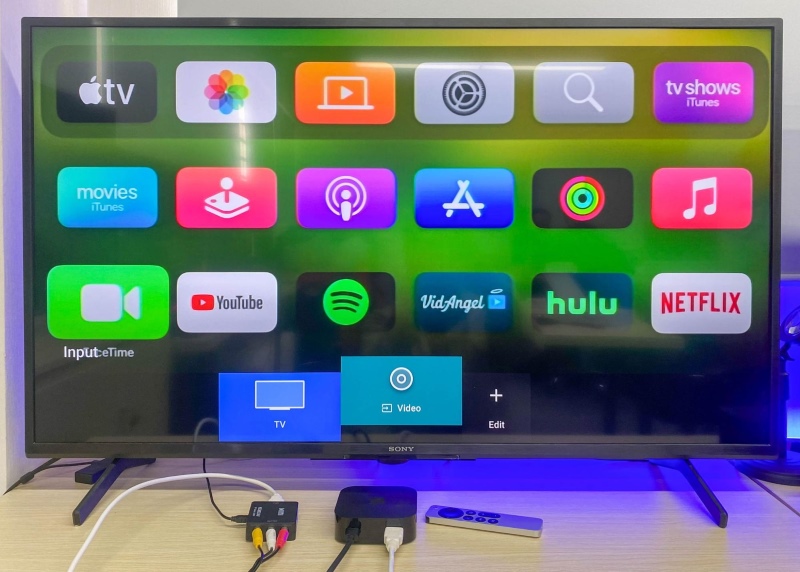 an Apple TV is connected to a Sony TV via HDMI to RCA converter