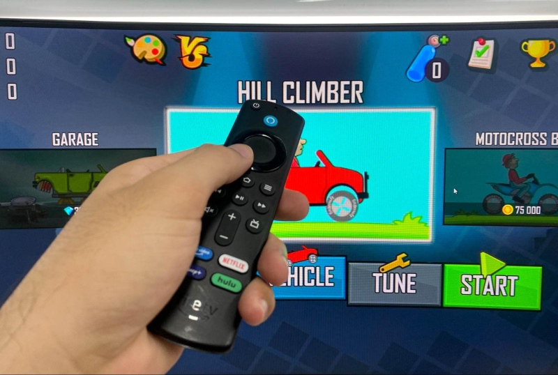 playing the Hill Climber game with the Fire Stick remote