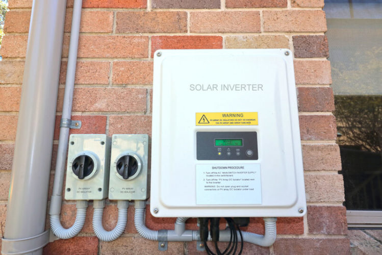 solar inverter on the side of the house