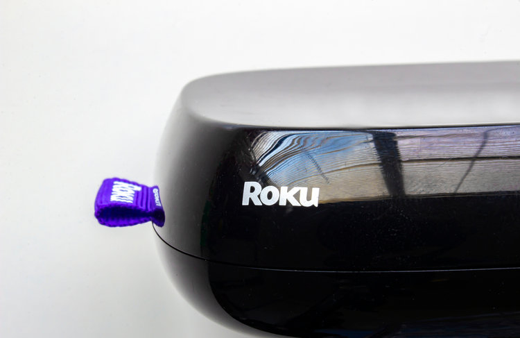 Roku box on the white table