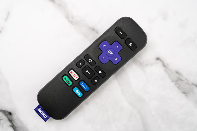 Roku remote on the stone table