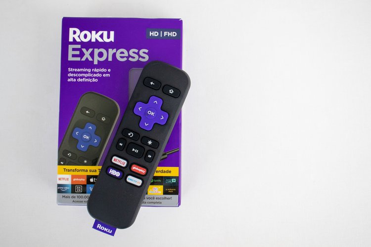 Roku remote on the white table