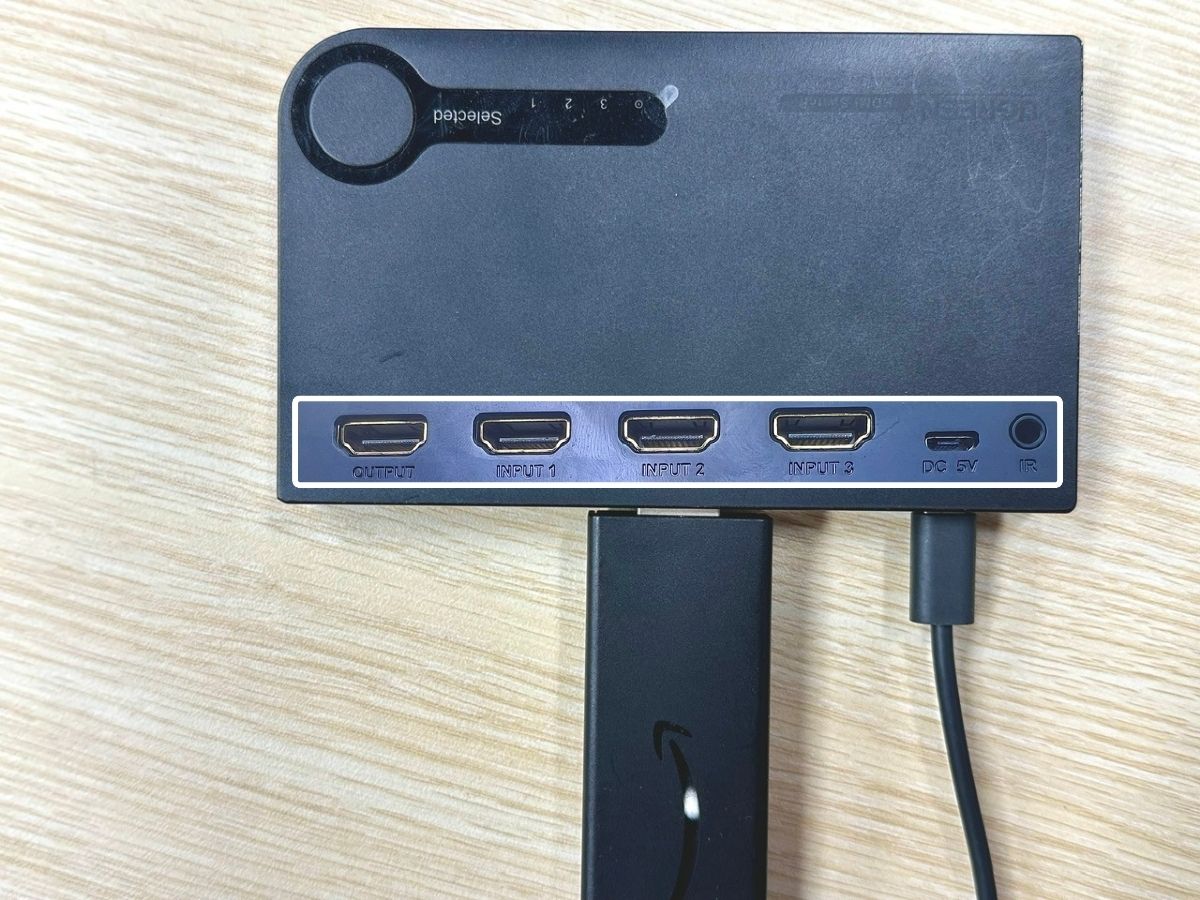 a fire tv stick is plugged into an hdmi switch