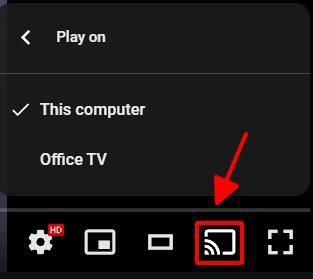 an arrow pointing at the cast icon on a youtube video