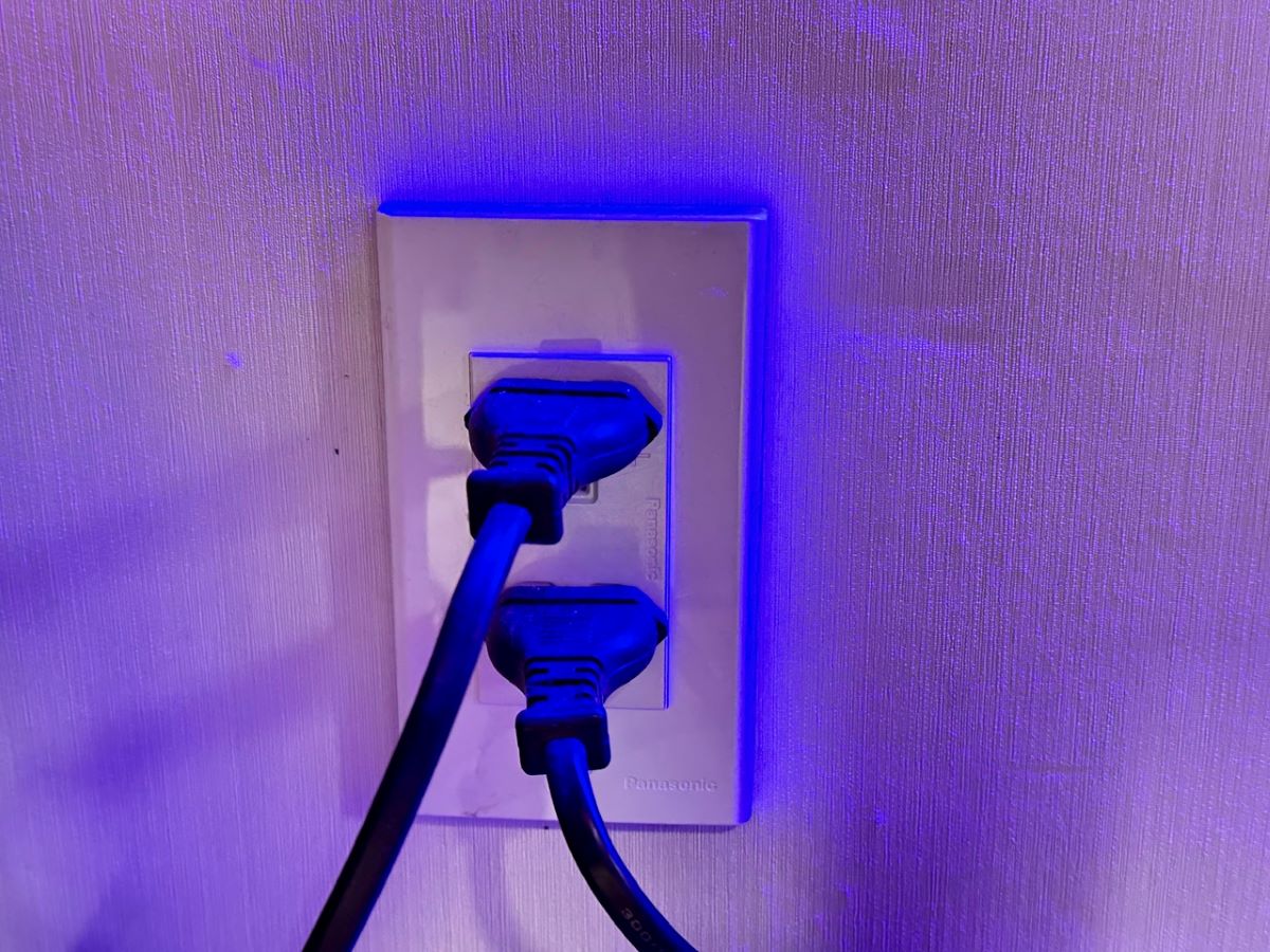 two power cords are plugged into wall outlets