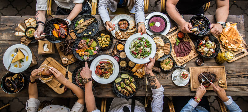 variety of food for dinner with friends