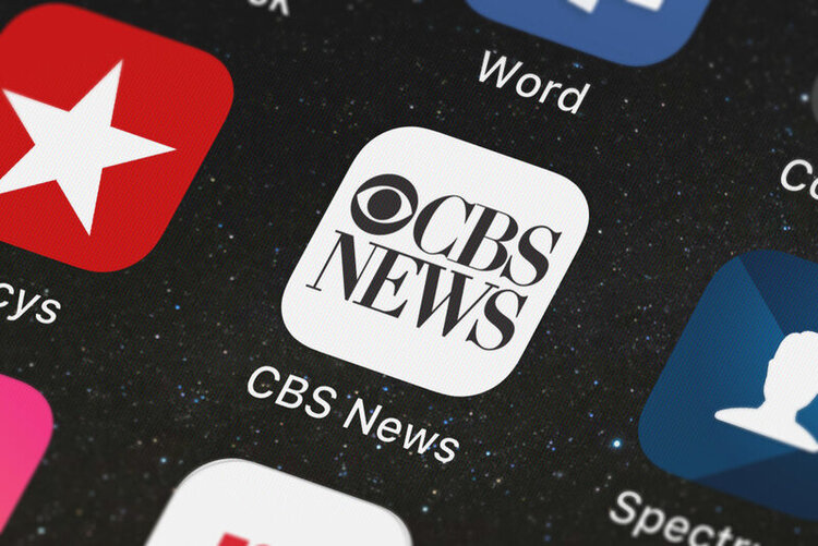 CBS News app and other apps on a phone screen