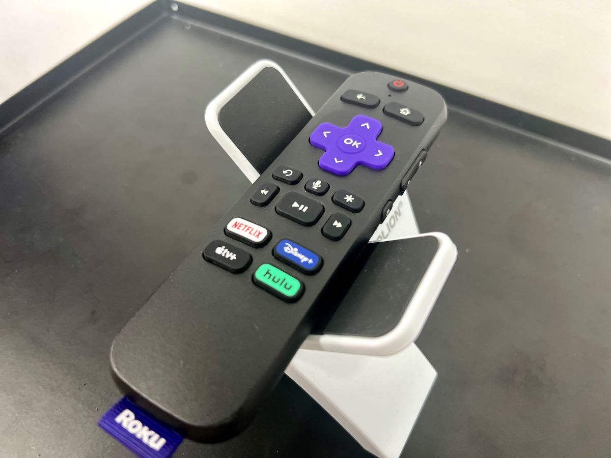a roku voice remote on a stand