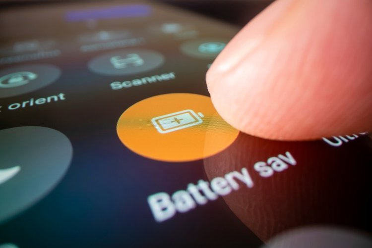 close-up view of turning on battery saver on a smartphone