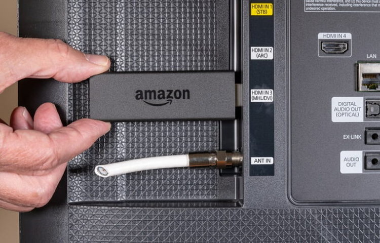 plugging the Fire Stick into TV’s HDMI port