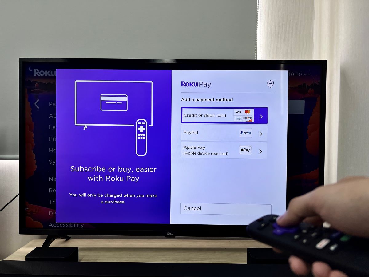 roku payment method page appears on an lg tv