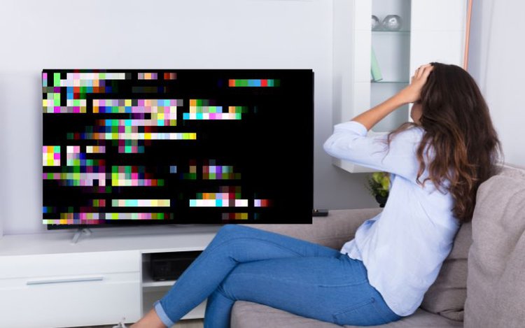woman frustrated with glitches on TV