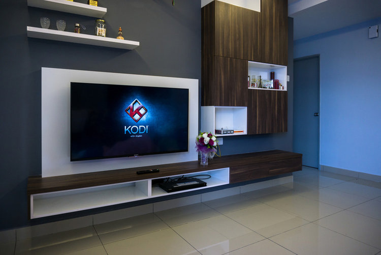 Modern TV in a living room with Kodi app display on screen