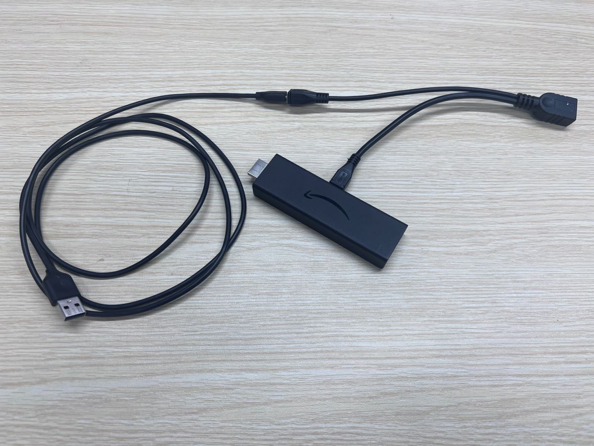 The complete setup of the Fire Stick with the OTG cable