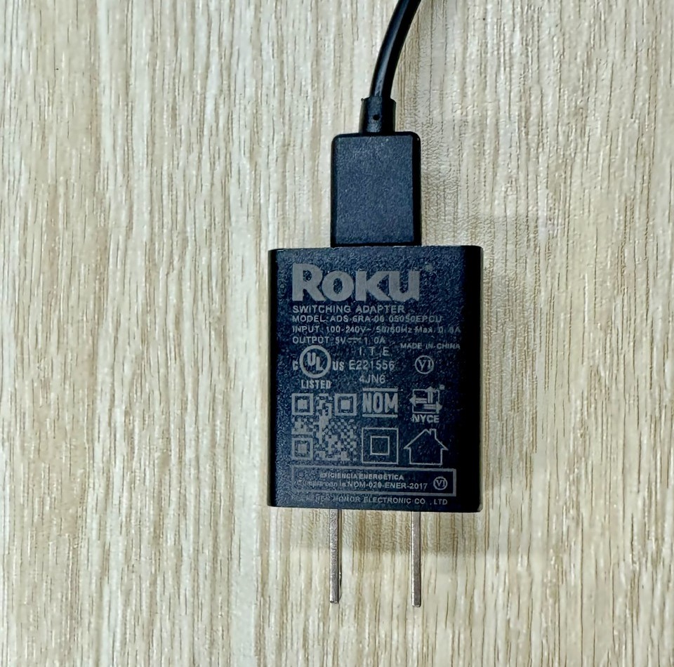 a roku adapter is on a table