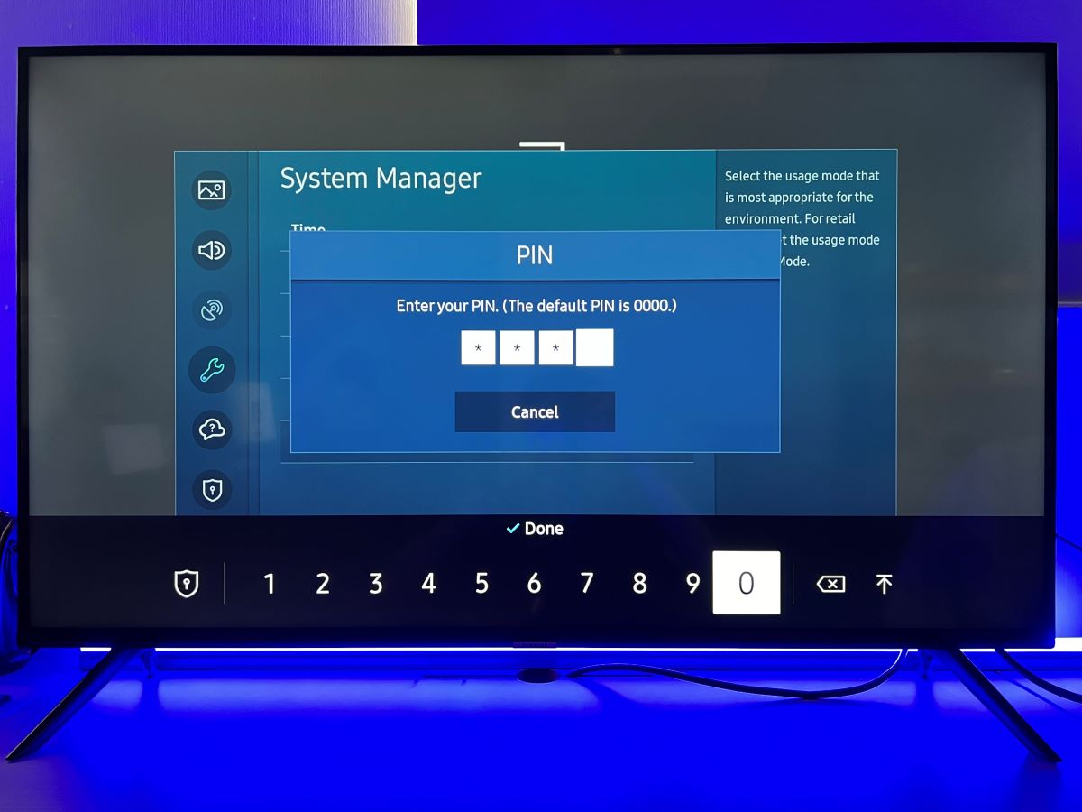 The system with the manager and the pin code is typing in on Samsung TV