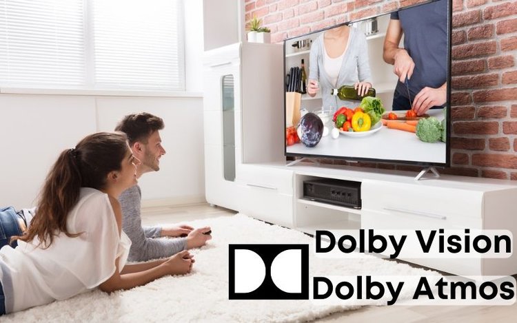 couple watching TV with Dolby Vision and Dolby Atmos