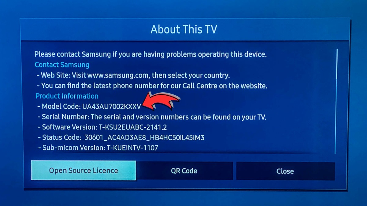 pointing to the Samsung TV model number on About This TV screen