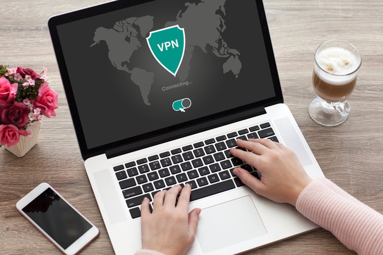 A person using VPN on their laptop