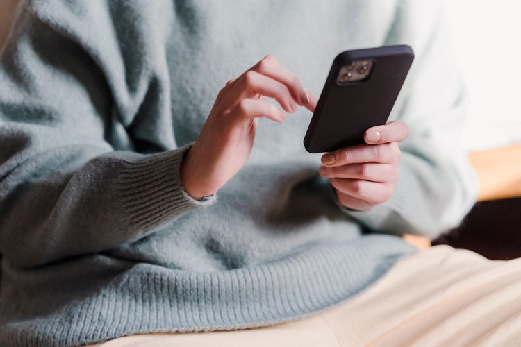 A woman using her phone