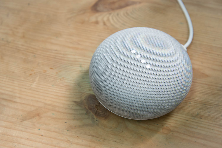 Google home on wooden table