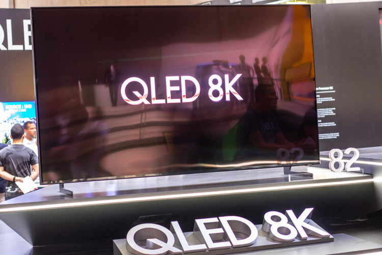 Samsung QLED 8K TV with legs on display