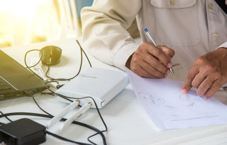 man working design installing wireless wifi devices