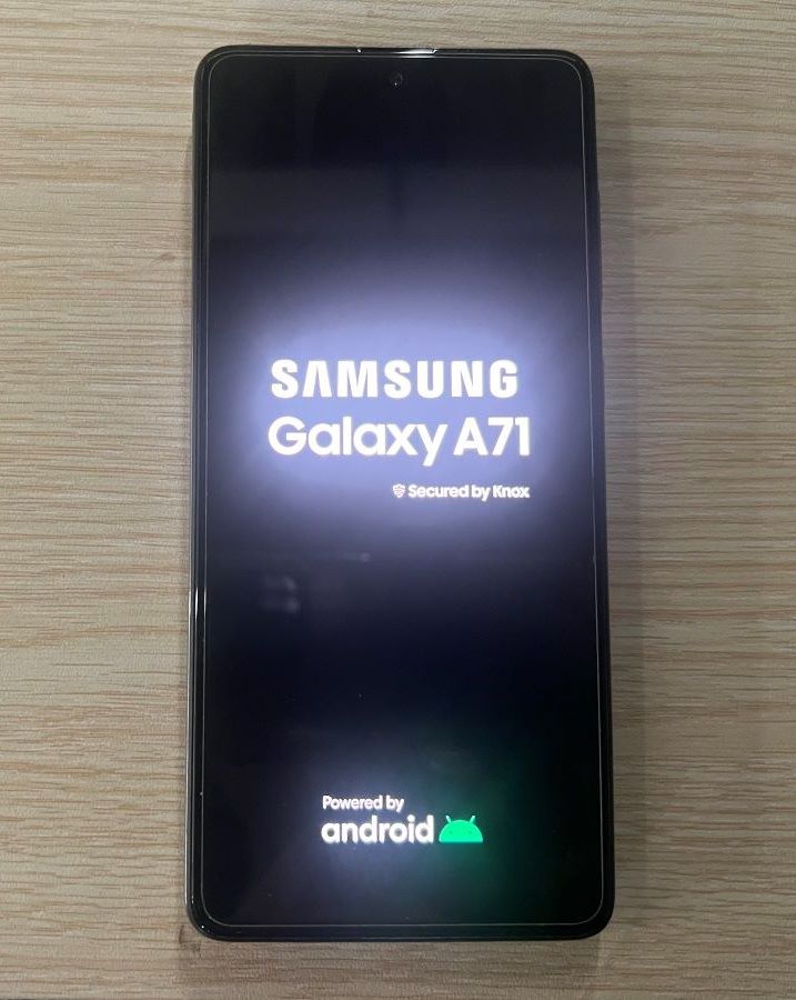 A Samsung A71 phone is restarting
