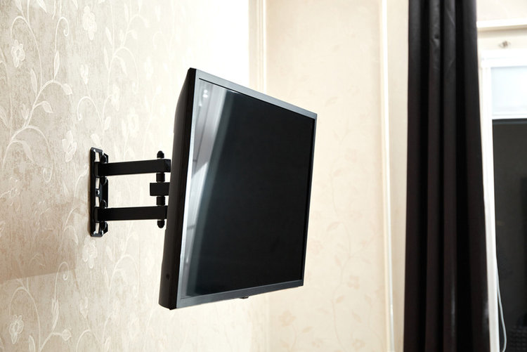 a TV mounting on the wall