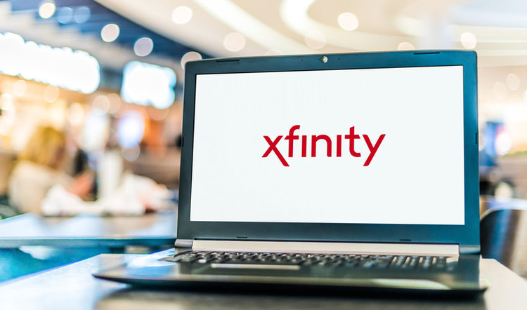 a laptop displaying Xfinity logo