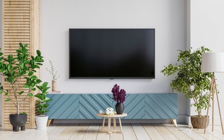 a modern TV on the wall in the living room
