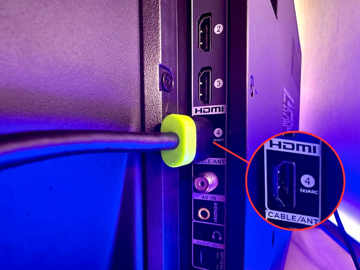 an hdmi cable is plugged into a tv's hdmi arc port