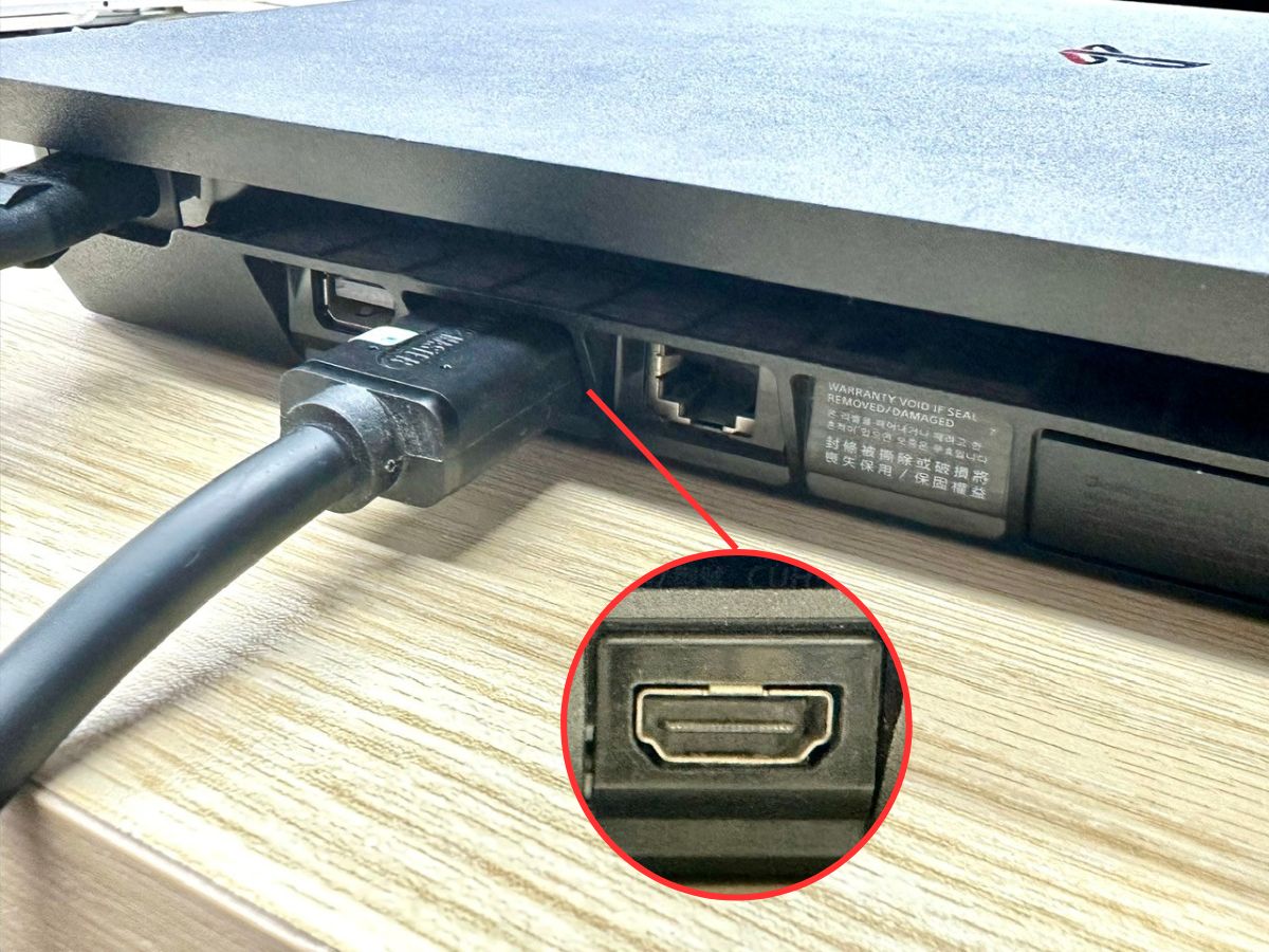 an hdmi cable is plugged into ps4's hdmi port