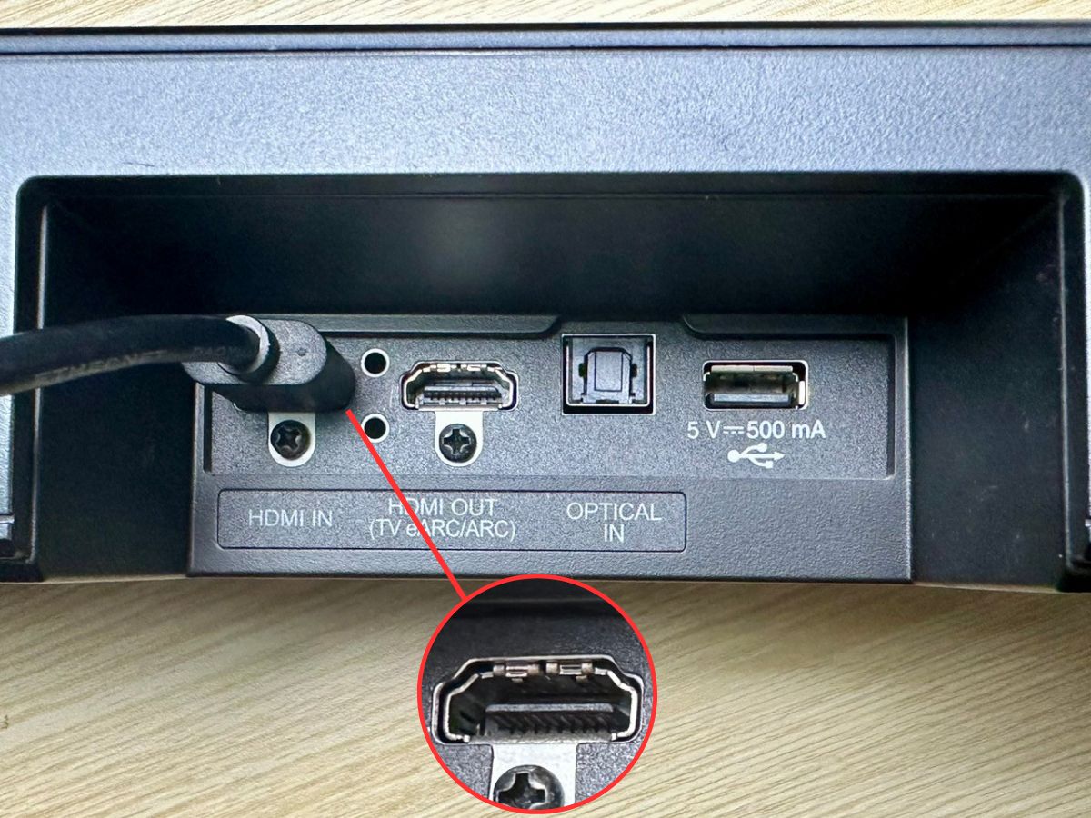 an hdmi cable is plugged into the soundbar's hdmi in port