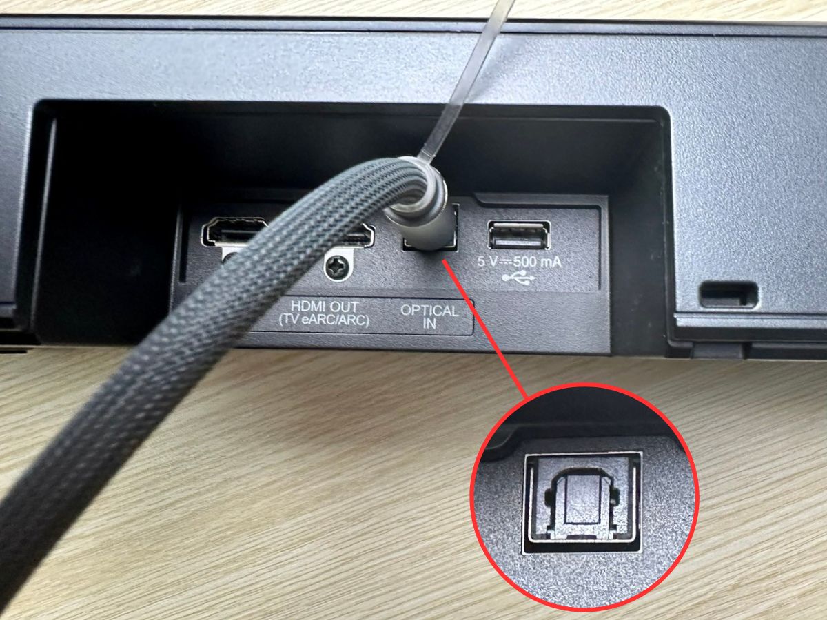 an optical cable is plugged into a soundbar's optical port