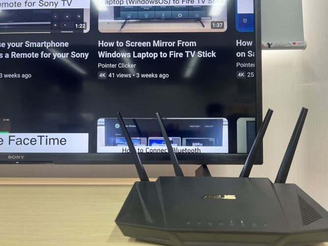 asus router next to a sony tv