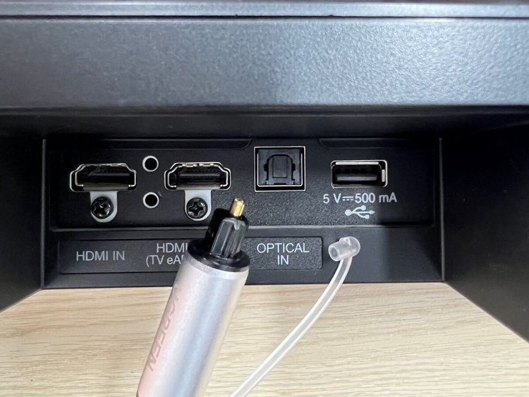 optical connector in front of the optical port of the soundbar