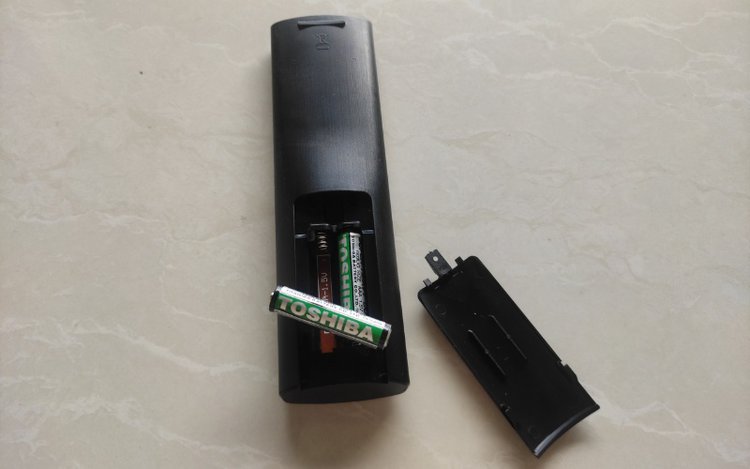 remove batteries from a LG TV remote