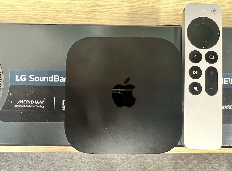 an apple tv placed above an lg soundbar