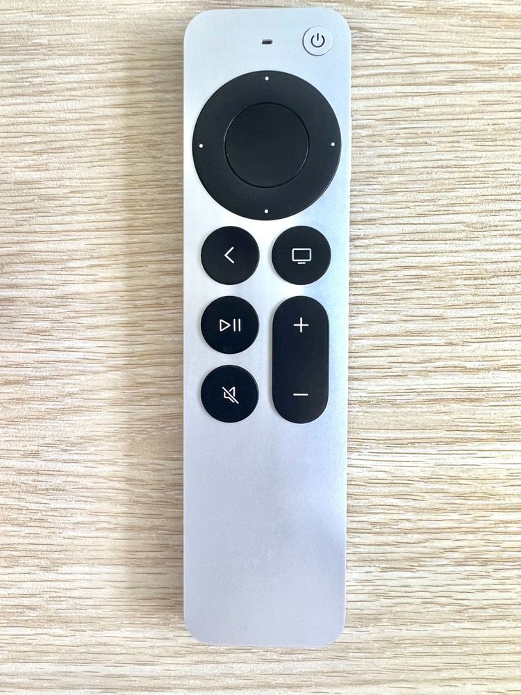 apple tv remote on a table
