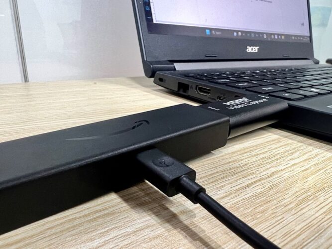 fire tv stick and a capture card are plugged into an acer laptop