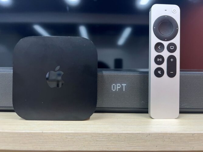 soundbar in optical connection method with an apple tv next to it